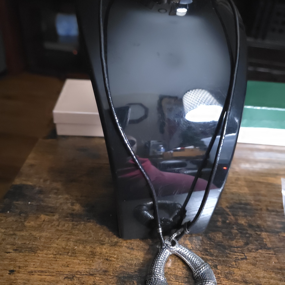 Black Cord Necklace with Silver Pendant
